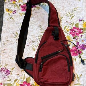 Nupouch travel bag with charging port. EUC